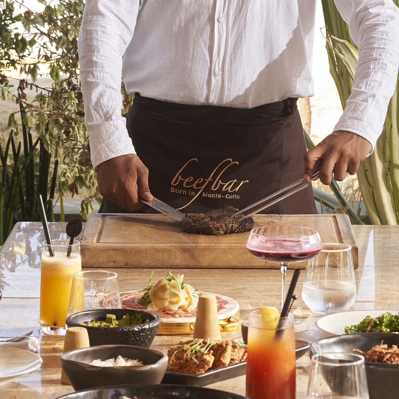 cuting a piece of meat restaurant
